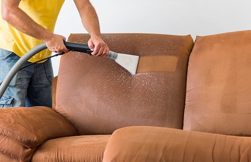 How to clean a suede couch? Tried with natural cleaner but now it