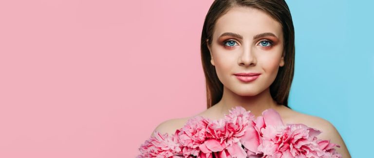 blue eyed woman wearing maekup